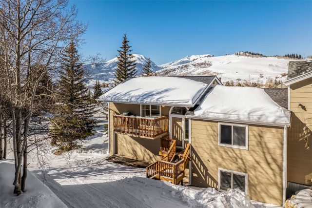 Duplex in Straight Creek Ponds, Dillon, CO — photo 1 (MLS S1056037)