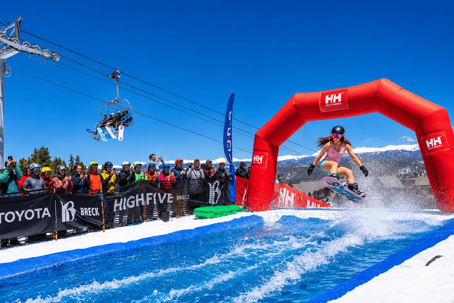 Breckenridge Ski Resort Closing Day Pond Skim Skiers participating in the Pond Skim event at Breckenridge Ski Resort