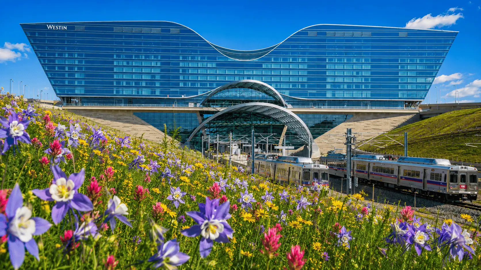 Transportation options available at DEN Ground transportation pickup area at Denver International Airport